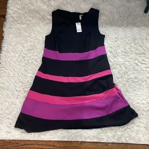 Only selling cause it is not my style and have to many dress. Never been worn!